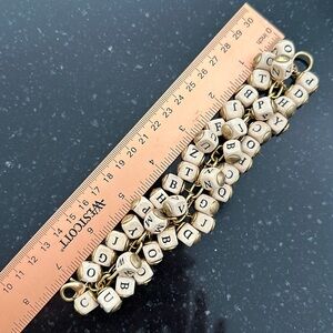Lenora Dame permanent iconic Alphabet collection.  7 1/2 inches long.